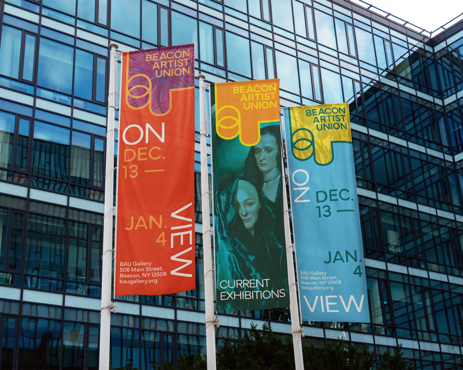 Vertical banners hanging on a glass building
